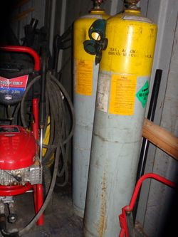 Empty A.C. recycling tanks, tool's