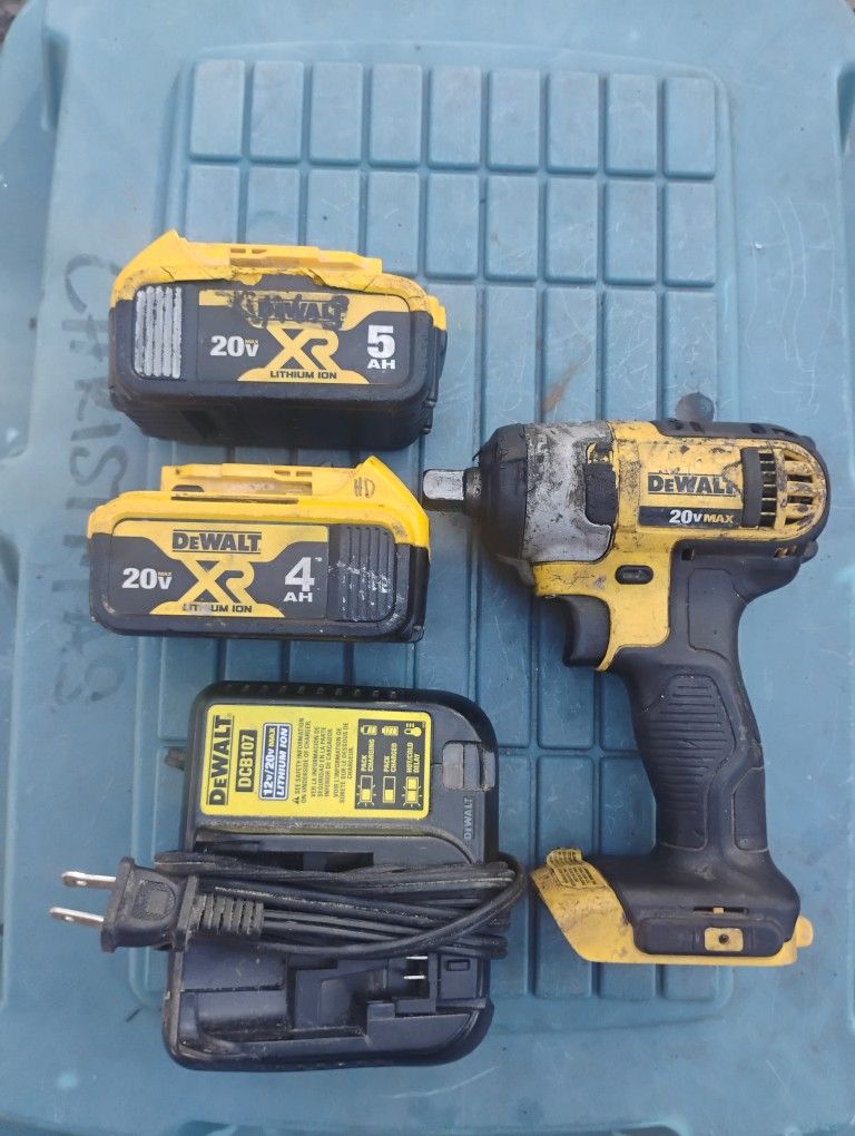  two DeWalt batteries a half inch impact and a charger