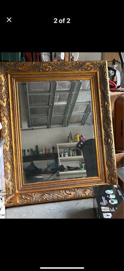 Antique large gold framed mirror
