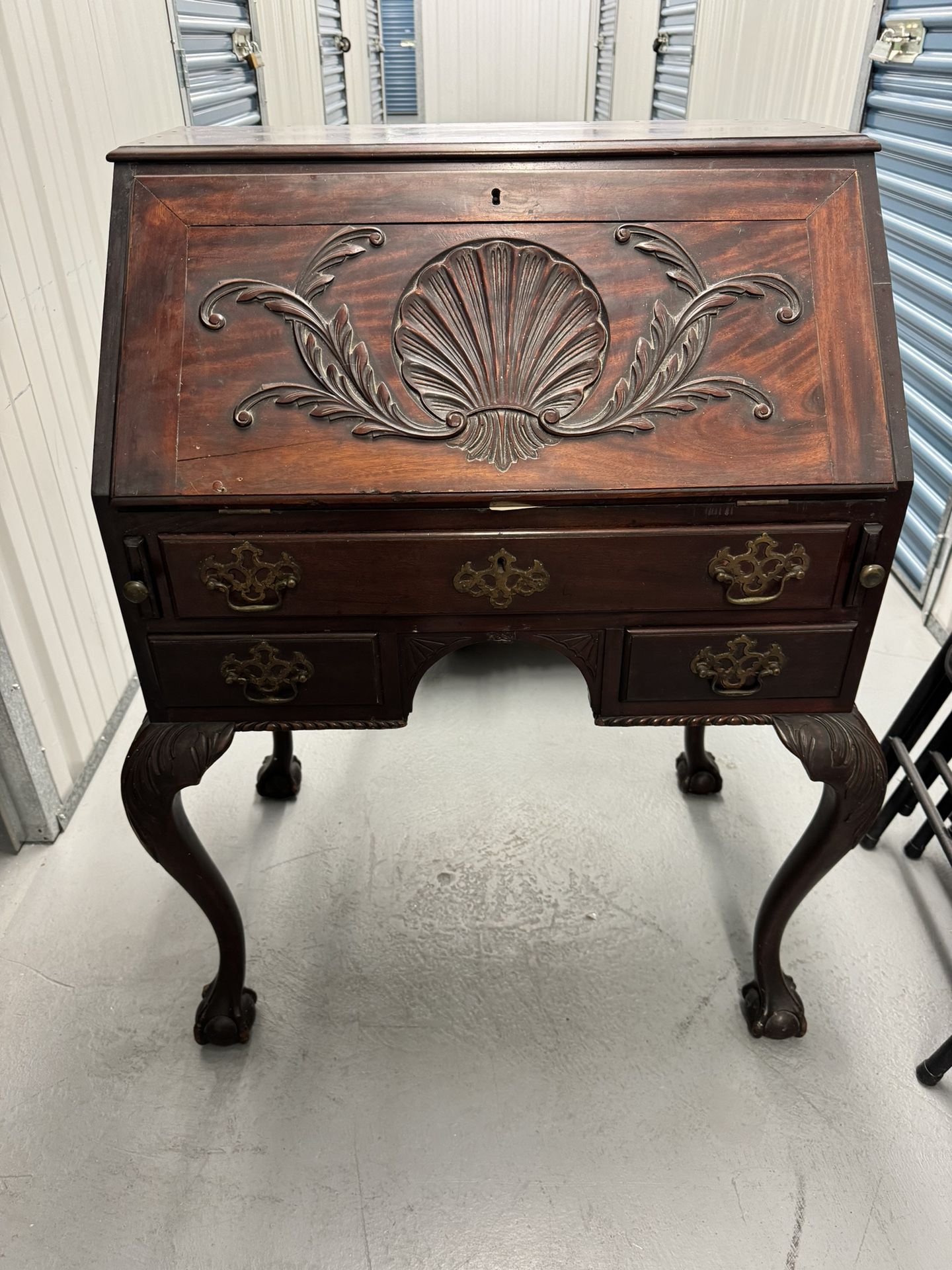 An American Chippendale style slant front writing desk