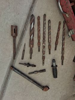 Old heavy duty Rodohammer with drill bits.
