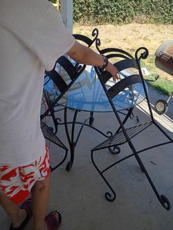 Glass and iron breakfast table