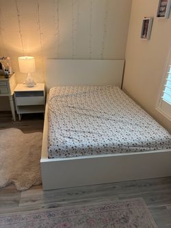 Full bed and nightstand