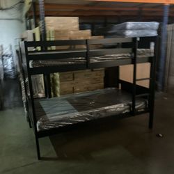 Twin over twin bunk bed. White or espresso. Assembly required. Assembly not included. Taxes included. Free delivery.  Bunk Bed only without Assembly-$