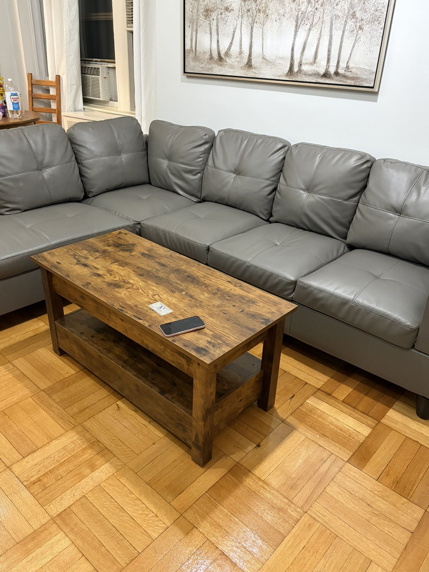 Gray Leather Sectional With Storage Ottomon