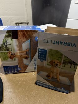 Two Boxes Of Training Pads Puppy Pads
