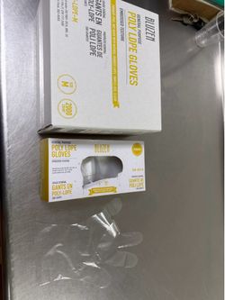 Box of poly single use gloves. Disposable , clear