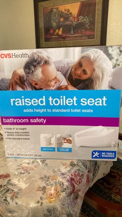 Raised toilet seat