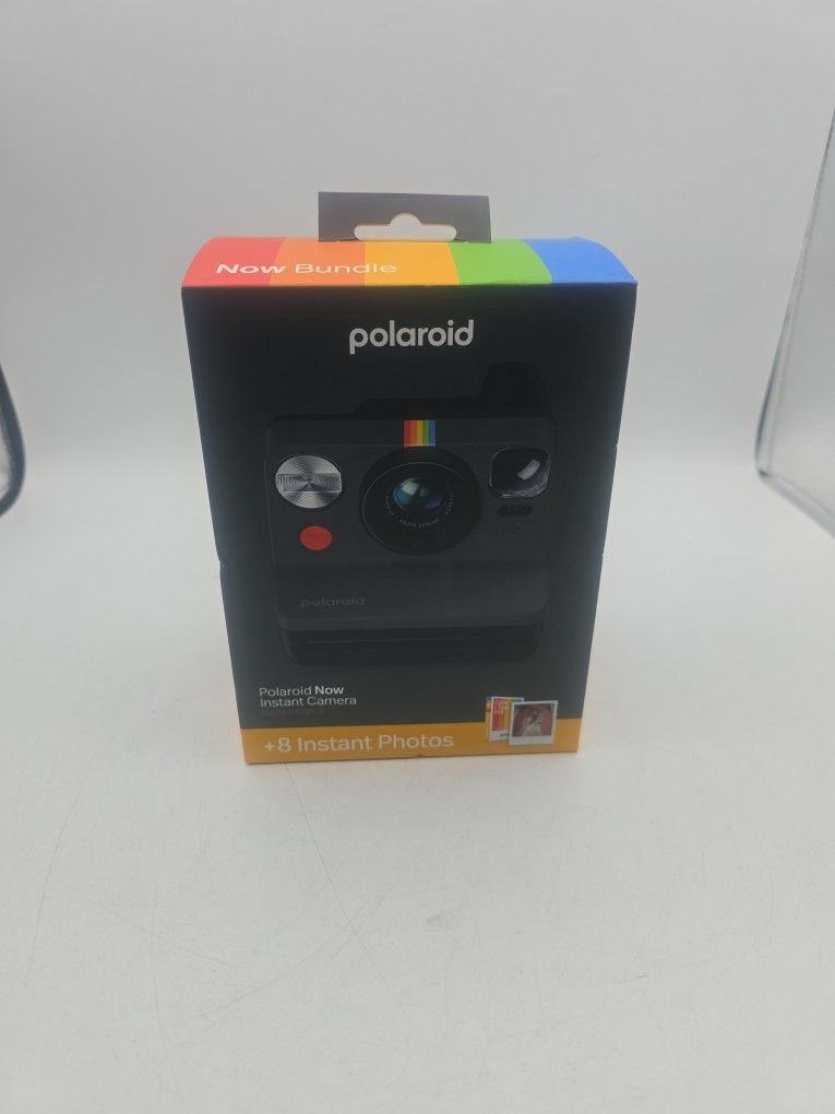 Polaroid Now Instant Camera, likely a Generation 2 or 3 model, known for its classic design and instant film capabilities.