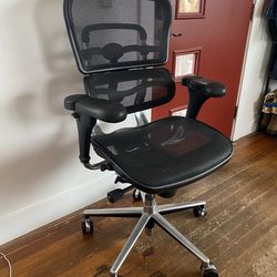 Comfy, slightly beat up office chair