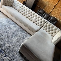 tufted, L-shaped sectional sofa with a chaise lounge. *champagne color* 