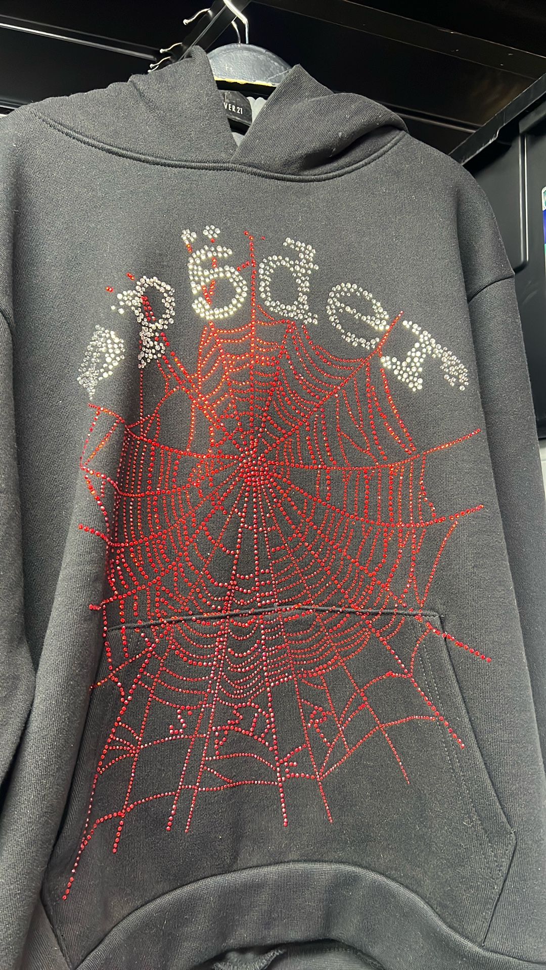 SP5DER Black hoodie with red gemstones