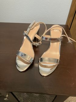 Price Just Reduced. 3 3/4” Brand New Silver High Heels 
