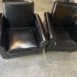 Set Of Black Chairs 32” Tall  30” X 28” Wide In good condition, no tears or rips.  