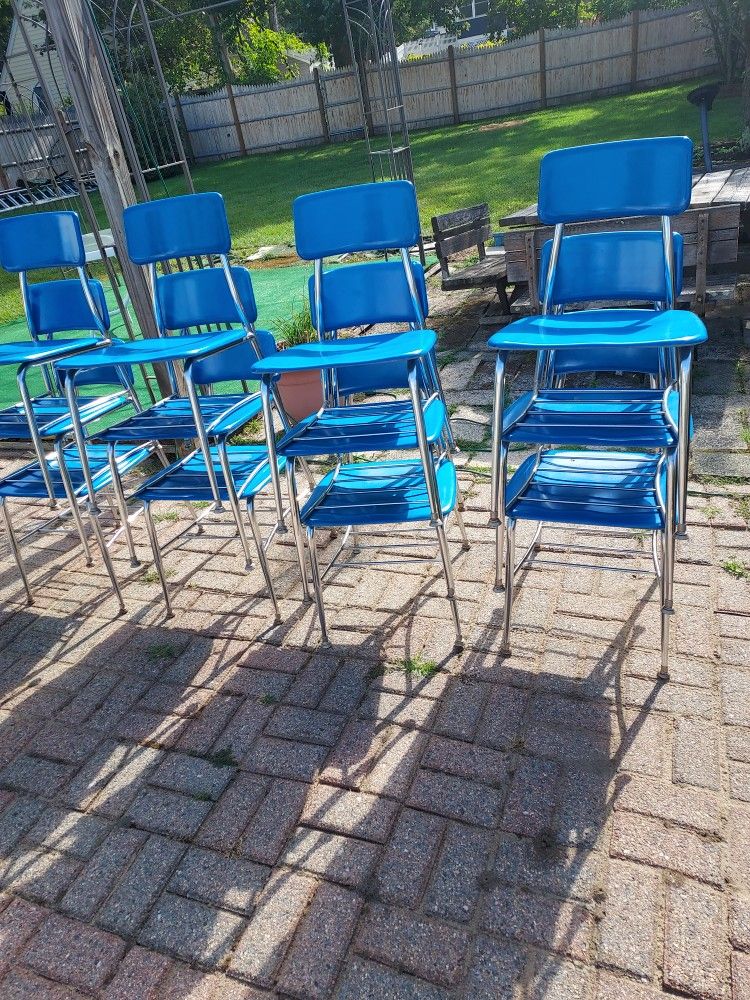 Twelve Metal Chairs