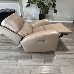Beige vinyl recliner