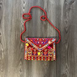 New With No Tag Red Background Colorful  Embodied Purse /Clutch  