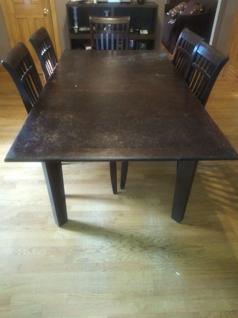Dining table and five chairs, coffee table, recliner at times has mechanical issues. Best offer