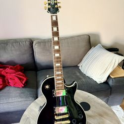 Epiphone Les Paul guitar black and gold