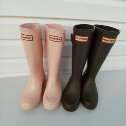 Hunter Boots Youth Size 1. One Pink Pair Of One Dark Green Pair.