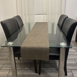 Glass dining table (chairs not included)