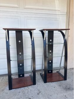 Metal with glass she stands