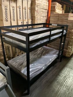 Twin bunk bed. Comes in espresso. Assembly required. Assembly not included. Taxes included. Free delivery.  Bunk bed only-$220 Bunk bed with mattresse