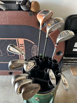 golf clubs and bag ready to go, irons, driver, 3 wood, 3 hybrid
