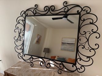 Solid rod iron mirror