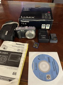 Panasonic Lumix DMC-TZ4 8.1MP Leica Digital Camera bundle W/ Battery SD Card charger in box tested