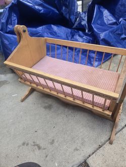 Antique bassinet for pretend play