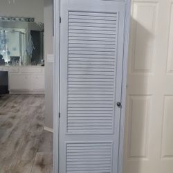 ABSOLUTELY GORGEUS BATHROOM CABINET IN LAVENDER COLOR LIKE NEW .KEEP A LOT OF STORAGE 20x14x63