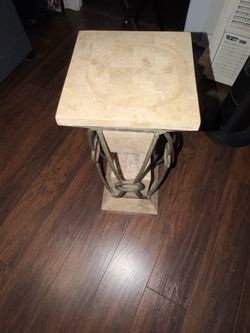Modern glass console table with matching wall decor