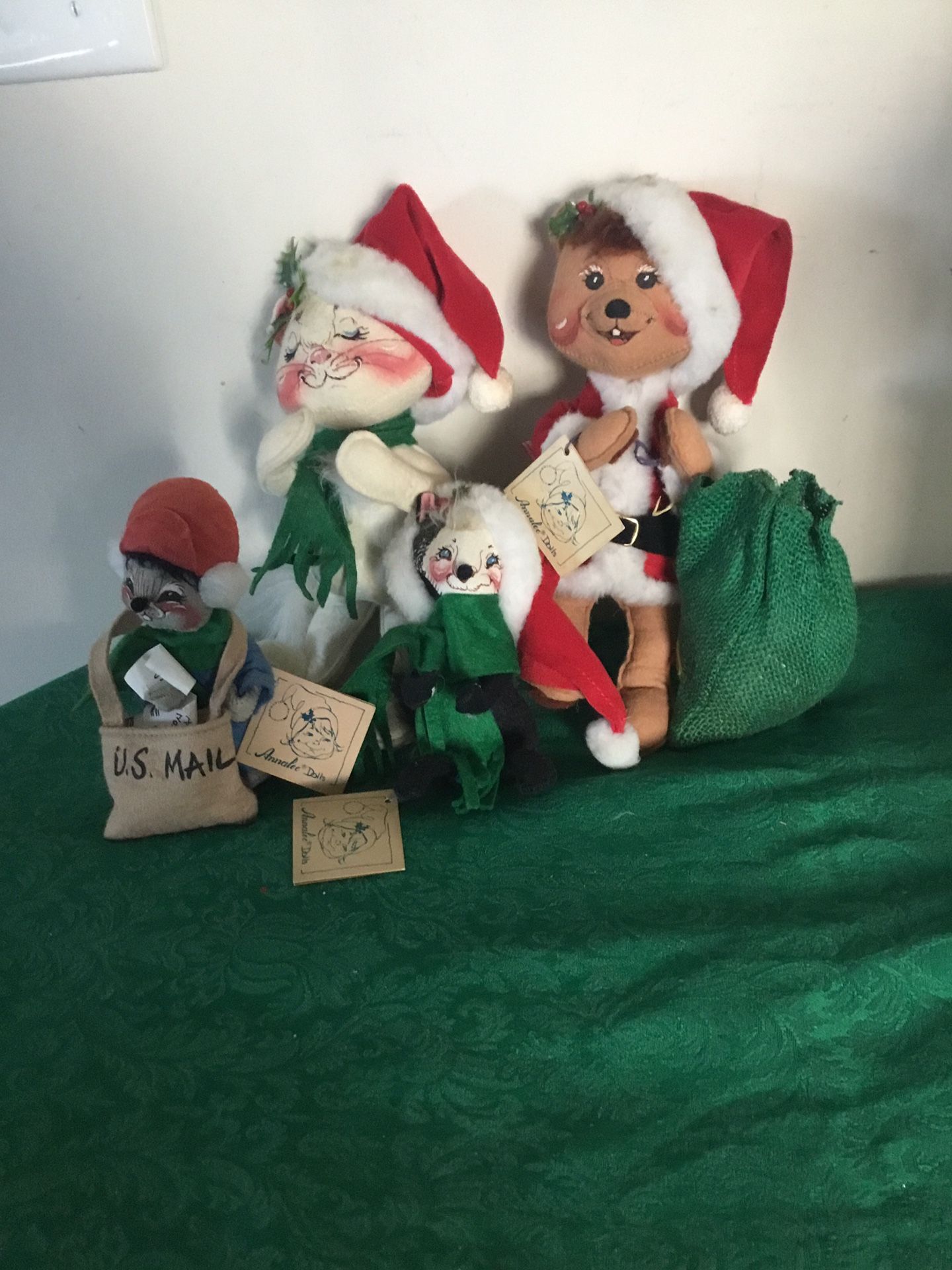 For vintage Annalee dolls Santa and postman, skunk