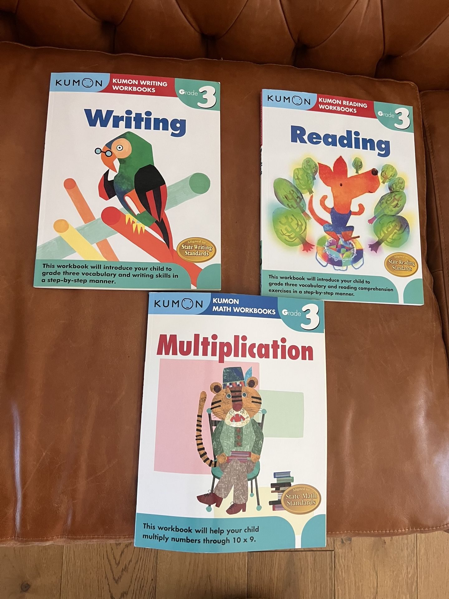Grade 3 Kumon workbooks: Reading, Writing, Multiplication, Set Of 3, Brand New