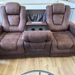 Reclining sofa with electricity charger.