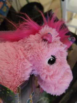 Light up unicorn lights up projector stars on to wall and ceiling