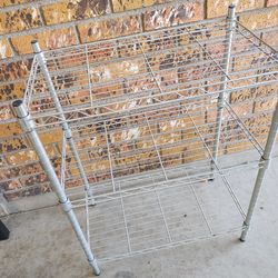 Short metal utility shelf