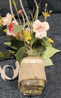 GLASS VASE WITH FAKE FLOWERS AND WHITE BOW