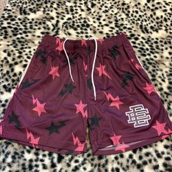 Red Bape EE shorts with pink stars, size medium