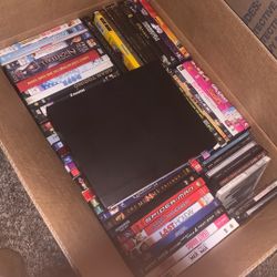 DVD Lot With DVD Player Crack At Top