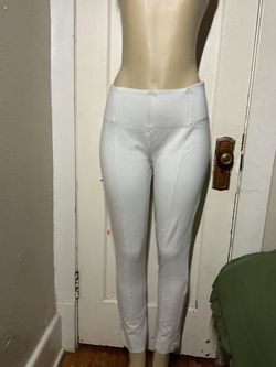 White high-waisted pants with stretch