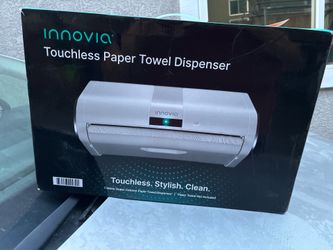 Touchless paper towel dispenser