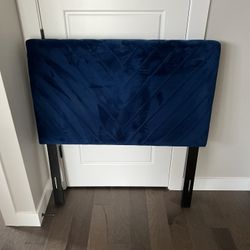 Blue velour upholstered headboard for twin size bed