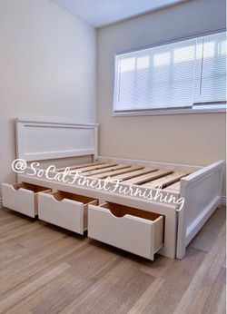 White full bed with drawers