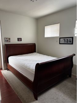 Solid wooden sleigh bed frame/Queen