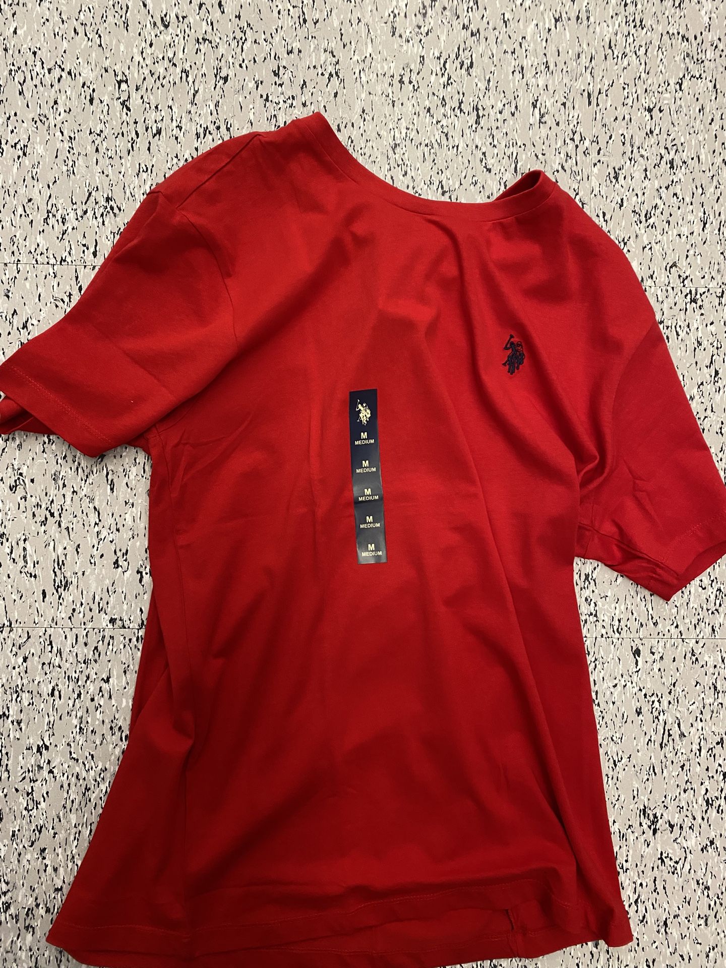 M red polo shirt