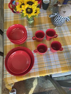 Plates, bowls, coffee cups and little plates