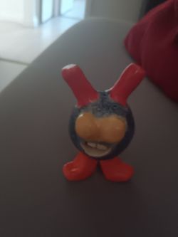 Small Red Character Toy Figure
