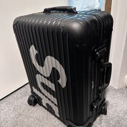 Rimowa X Supreme 45L